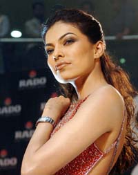 A model displays a creation from Swiss watch company Rado during a fashion show in Bangalore on Thursday. Rado organised the show to launch its premium range of diamond--studded Sintra paved watches, a collection which is priced between Rs 2.8 lakh and Rs 4.36 lakh. 