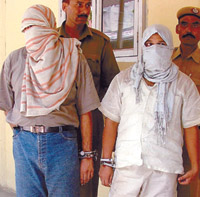 Ziauddin and Shahzad, accused in robbery-cum-murder of a businessman, in the custody of Central Dist police in the Capital