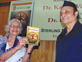 Kapila Vatsayan, Life Trustee, India International Centre, releases Hinduism, a book by Dr. Karan Singh, MP & Dy Leader of the Congress in Rajya Sabha, at a function at India Habitat Centre in the Capital on Friday. 