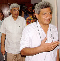 CPM Secretary-General Prakash Karat (left) and Sitaram Yechuri at a meeting of the Left parties in New Delhi, on Friday.