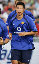 Manchester Uniteds Chinese soccer player Dong Fangzhuo takes part in a training session in Hong Kong