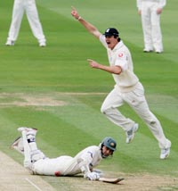 Englands Kevin Pietersen celebrates after running out Australian batsman Justin Langer on the second day of the first Test at Lords