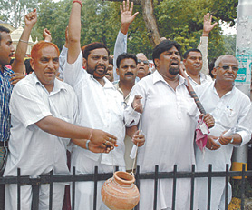 MCD sweepers during a demonstration against the privatisation in MCD at Jantar Mantar in the Capital on Saturday.