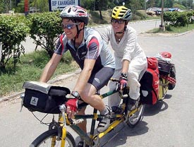 An Austrian couple, Stefan and wife Annita, at Wagah in Amritsar. They are on a world tour on a bicycle promoting peace.