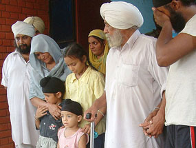 Mr Mohinder Singh Bajaj (second from right) along with other members of his family, who were brought back by the Majitha police in Amritsar on Sunday