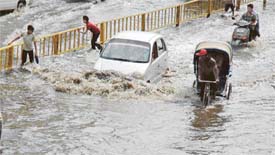 Commuters caught in knee-deep water at Domoria Bridge after showers in Ludhiana
