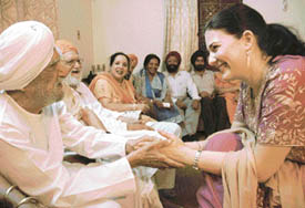 G.S. Giani blesses his granddaughter-in-law who has come from the US for his 100th birthday on Tuesday.