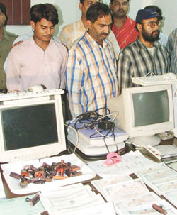 Three men Arun Kumar, Ved Pal Batra and Laxman who were involved in a racket of forged degrees, certificates etc in the custody of Special Staff of Central District police in the Capital on Monday