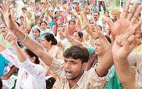 Members of the Punjab State Aided School Teachers and Other Employees Union hold a demonstration in Chandigarh
