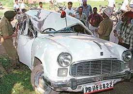 The Ambassador car with a red light after it rammed into a tree in Sector 7, Panchkula, on Tuesday