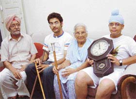 PAST GLORY: Engineer Partap Singh (first from left), with wife and grandsons, shows relics of freedom struggle