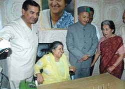 Newly appointed state Congress President, Viplove Thakur (second from left) takes charge at the Congress office in Shimla on Wednesday. 