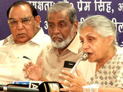 Chief Minister Sheila Dikshit during a seminar on Are Representatives Elected By People Discharging Their Responsibilities? If Not What Are The Reasons? at Old Delhi Secretariat in the Capital on Thursday. Union Minister of Power P.M. Sayeed and Delhi Legislative Assembly Speaker Ch. Prem Singh are also seen. 