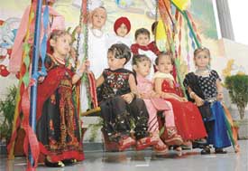 Tiny tots of Sky Way School, Ludhiana, dressed in traditional clothes, have fun during Teej celebrations on Thursday