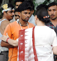 Honda Motor factory workers, who were injured in Gurgaon in a clash with the Haryana police during a protest rally on July 25, meet Congress President and UPA Chairperson Sonia Gandhi at her residence in New Delhi on Friday. 