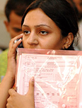 A young taxpayer queues up to file her income tax returns before the deadline expires on Sunday. There are about three crore tax assessees in India with about 60 lakhs of them in Delhi alone.