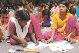 Inmates of Nirmal Chhaya at Tihar Jail participating in a painting competition organised by Mitra, an NGO, in the Capital on Saturday.