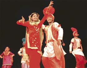 Students of Punjabi University perform during a cultural programme at the national conference of the Indian Public Administration Association in Patiala