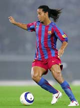 Barcelonas Ronaldinho dribbles during an exhibition soccer match against Yokohama Marinos in Yokohama on Saturday