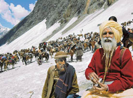 Ponywallahs wait near the cave for the pilgrims
