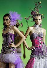 Models display a creation by Malaysian designer Muhammad Hatta Dolmat, a finalist of the Piala Jarum Berlian fashion competition, during the Kuala Lumpur Fashion Week, 2005, in Malaysia on Sunday. 