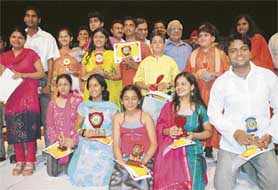 Winners of Best Singer Award 2005 with the Editor-in-Chief, The Tribune publications, Mr H.K. Dua, at Tagore Theatre, Chandigarh, on Sunday. The programme was organised by the Yaadgar-e-Rafi Society. 