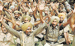 Punjab Home Guards stage a protest against non-acceptance of their demands at Matka Chowk on Monday. 