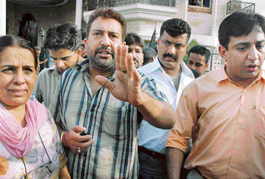 Protesting members of a delegation led by Mr Subhash Kaushal at Panchkula on Monday.