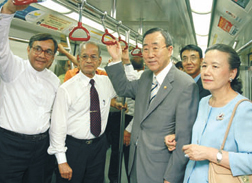 South Korean Minister of Foreign Affairs and Trade Ki-Moon Ban and his wife travelling on the Metro between Patel Chowk and New Delhi Stations in the Capital on Monday. Also seen in the picture is DMRC Managing Director E. Sreedharan.