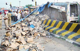 Cases of whiskey that were damaged when a truck, transporting the cases to the CSD Canteen at Jalandhar, overturned at Gagan Chowk, Rajpura