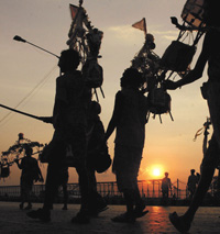 Homeward-bound Kanwarias on the eve of Jal Abhishek on the occasion of Chaturdeshi of Sawan in the Capital on Tuesday
