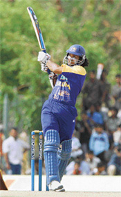 Sri Lankas Kumar Sangakkara hits a boundary during their  tri-series one-day international against the West Indies in Dambulla on Tuesday