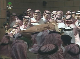 The body of King Fahd of Saudi Arabia being carried at his funeral in Riyadh on Tuesday