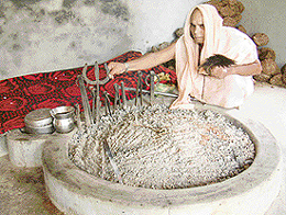 A Nath jogi sits near the dhuni that has been smouldering for the past nine centuries.