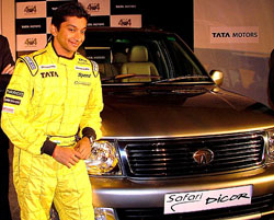 Formula One racing star Narain Karthikeyan poses during the launch of new premium SUV Tata Safari Dicor in New Delhi on Wednesday. 