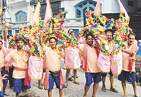 Kanwarias on way to Sangla Wala Shivala, the oldest Shiv temple in Ludhiana, to offer the Ganges water to Shivling on the occasion of Shravan Shivratri on Wednesday.