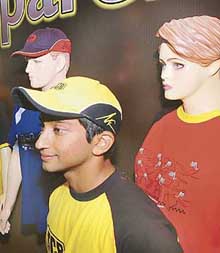 Narain Karthikeyan poses for photographers during a press conference as he signs for JCB India as brand ambassador for apparels segment in New Delhi on Thursday. Construction major JCB India Ltd forayed into the apparel business and the product range would be manufactured, sourced and marketed by Switcher Quality Textiles.
