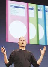Apple Computer Inc. Chief Executive Officer Steve Jobs speaks as he launches Apples music download service, the iTunes Music Store, in Tokyo on Thursday.