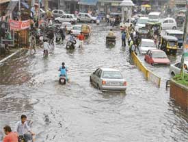 The road near Domoria Bridge after it poured for one hour on Thursday afternoon