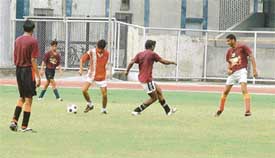 A football match in pogress during the District School Inter-Zonal Tournament being held in Ludhiana