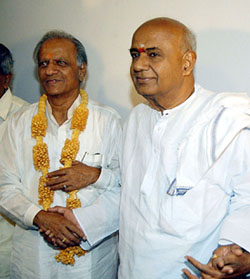 Former Prime Minister and JD(S) President H.D. Deve Gowda greets newly elected Deputy Chief Minister and leaderof JD (S) legislative party M.P. Prakash at his residence in Bangalore on Thursday. 