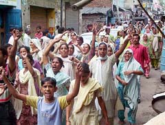 Residents of the Kucha Quarter locality, Pathankot, take out a protest march on Saturday demanding the immediate arrest of those responsible for the death of a house maid.