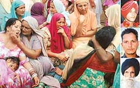 Wailing relatives of a Kharar family, and the victims