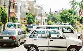 Haphazard parking outside duplex houses in Modern Housing Complex, Mani Majra, Chandigarh. 