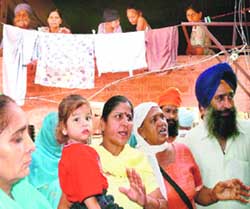 Victims of the1984 riots protest in Mohali against the Nanavati Commission Action Taken Report which was tabled in Parliament on Monday. 