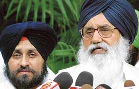 Shiromani Akali Dal President Parkash Singh Badal addresses a press conference in New Delhi on Monday after the Nanavati Commission report was tabled in Parliament