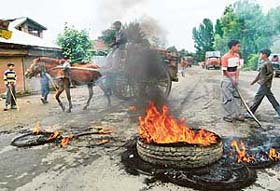 Youths turn violent at Sopore on Monday in protest against death sentence by the Supreme Court to Afzal Guru