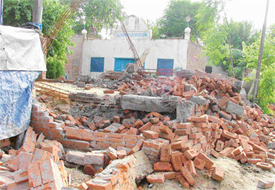 A structure that was demolished on the premises of a gurdwara at Transport Nagar in Ludhiana on Monday