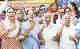 Victims of the 1984 riots stage a protest in Ludhiana on Monday