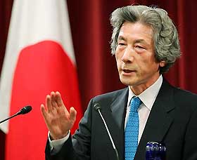 Japanese Prime Minister Junichiro Koizumi speaks to reporters during a news conference in Tokyo on Monday